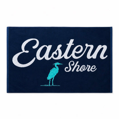 A rectangular navy blue mat or rug with the words &