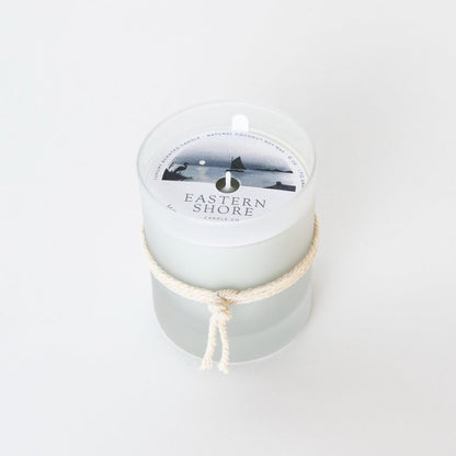 Moon over the River Miles 6oz candle with the illustration dust cover, Sailboat on the River Miles outside of St. Michaels in MD.  Eastern Shore Co. Candle box with candle on wooden tray. Hand poured in very small batches on the eastern shore. saint michaels, st. michaels, moon, moonlight, moonlit, amber scent, jasmine scent, night blooms scent, summer candle, sultry candle, Scented candle, coconut soy wax, coastal candle, eastern shore, Chesapeake Bay, luxury candle, hand-poured, Maryland, Virginia, 