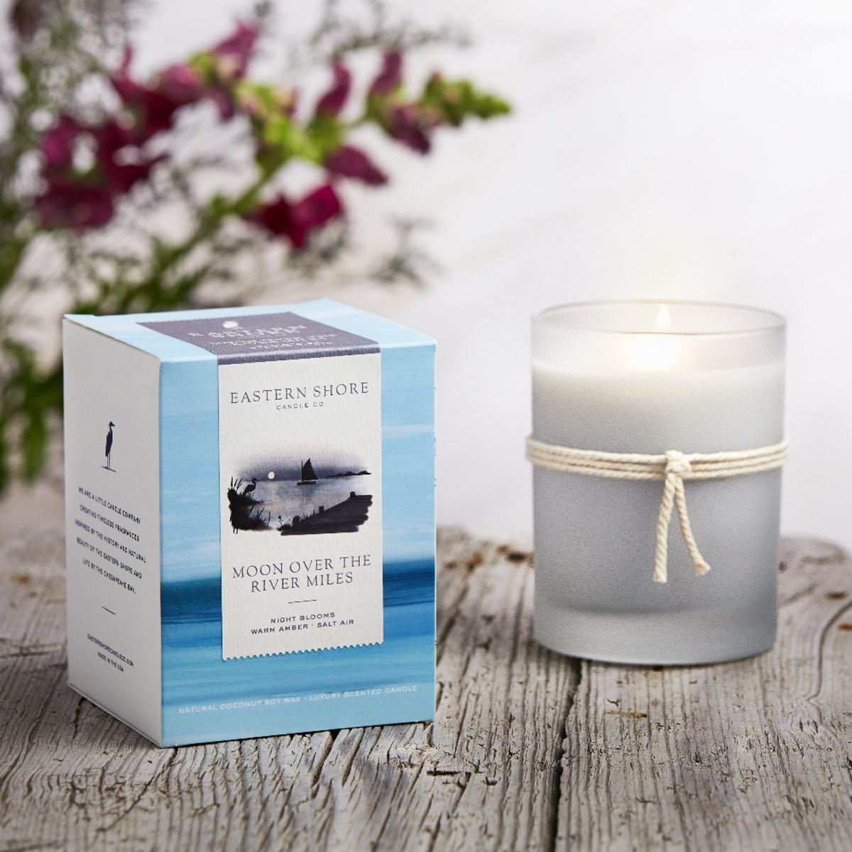 Moon over the River Miles scented 10oz candle, Eastern Shore Co. Candle box with candle on wooden board. Hand poured in very small batches on the eastern shore. saint michaels, st. michaels, moon, moonlight, moonlit, amber scent, jasmine scent, night blooms scent, summer candle, sultry candle, Scented candle, coconut soy wax, coastal candle, eastern shore, Chesapeake Bay, luxury candle, hand-poured, Maryland, Virginia, 