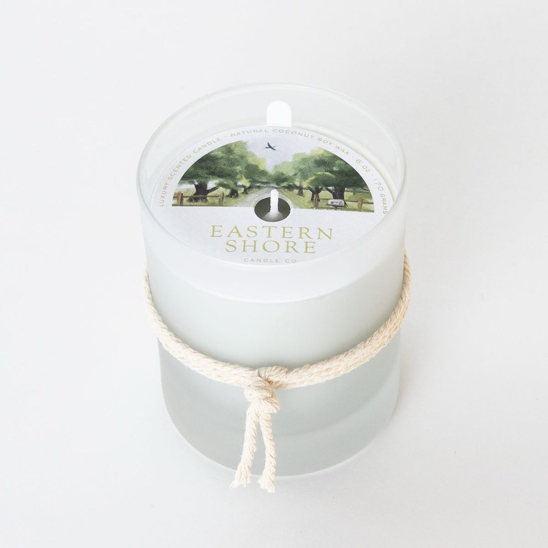 A Sunday Drive 6oz candle with dust cover, Eastern Shore Co. hand poured in very small batches, Scented candle, coconut soy wax, coastal candle, eastern shore, Chesapeake Bay, luxury candle, hand-poured, Maryland, Virginia, candle gift, coastal gift, Spring candle scents, spring scents, floral candle, floral scents, Sunday Drive, spring blossoms, sweet grass, fresh air, spring air, honeysuckle scent
