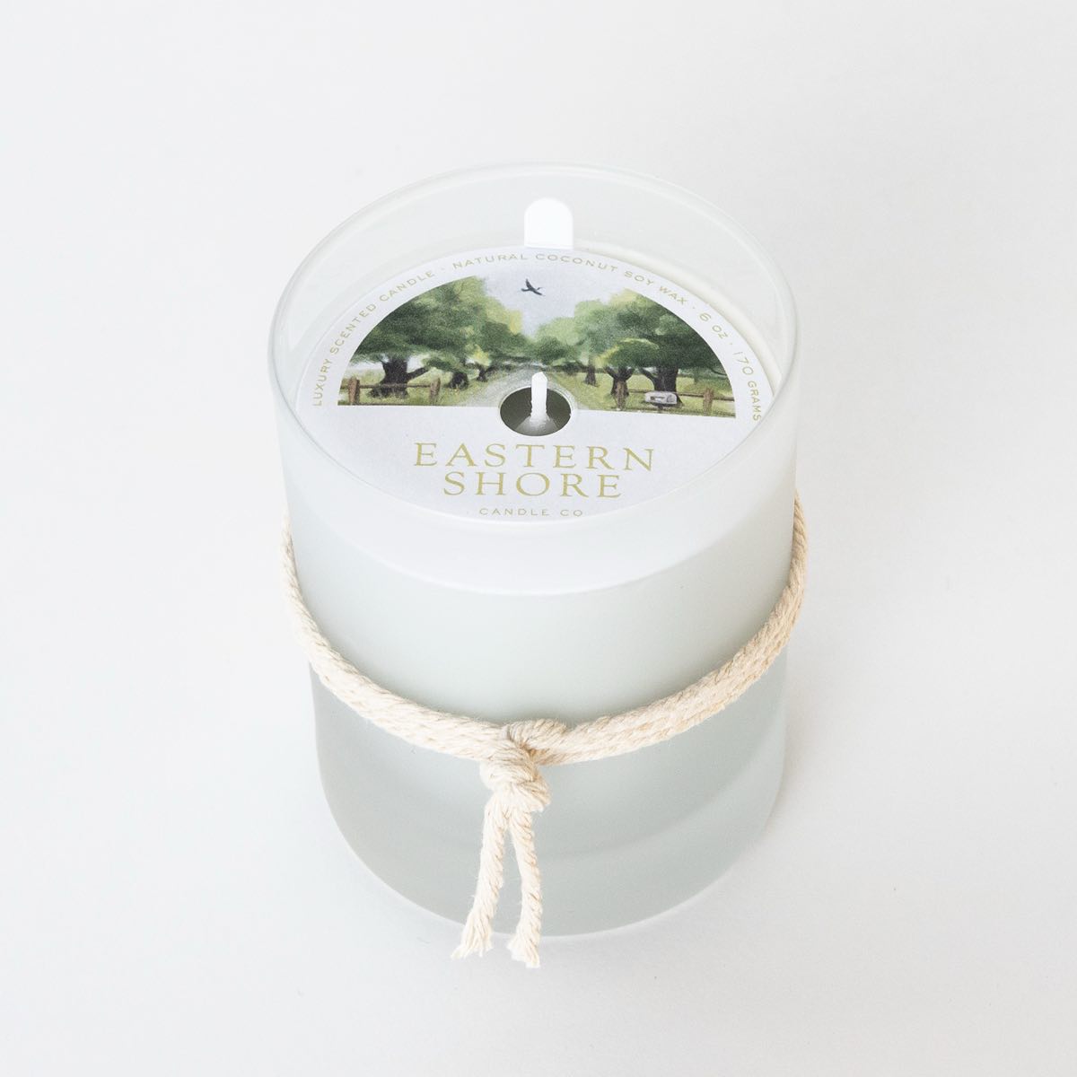 A Sunday Drive 6oz candle with dust cover, Eastern Shore Co. hand poured in very small batches, Scented candle, coconut soy wax, coastal candle, eastern shore, Chesapeake Bay, luxury candle, hand-poured, Maryland, Virginia, candle gift, coastal gift, Spring candle scents, spring scents, floral candle, floral scents, Sunday Drive, spring blossoms, sweet grass, fresh air, spring air, honeysuckle scent
