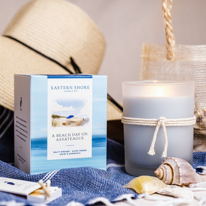 Beach Day on Assateague Island 10oz candle shown with box, Eastern Shore Co. Hand poured in very small batches, gardenia, dune grass, sea breeze, salty air, Scented candle, coconut soy wax, coastal candle, candle gift, coastal gift, eastern shore, Chesapeake Bay, luxury candle, hand-poured, Maryland, Virginia, Beach day, beach candle, coastal candle, Assateague Island, Chincoteague Island, Barrier Islands